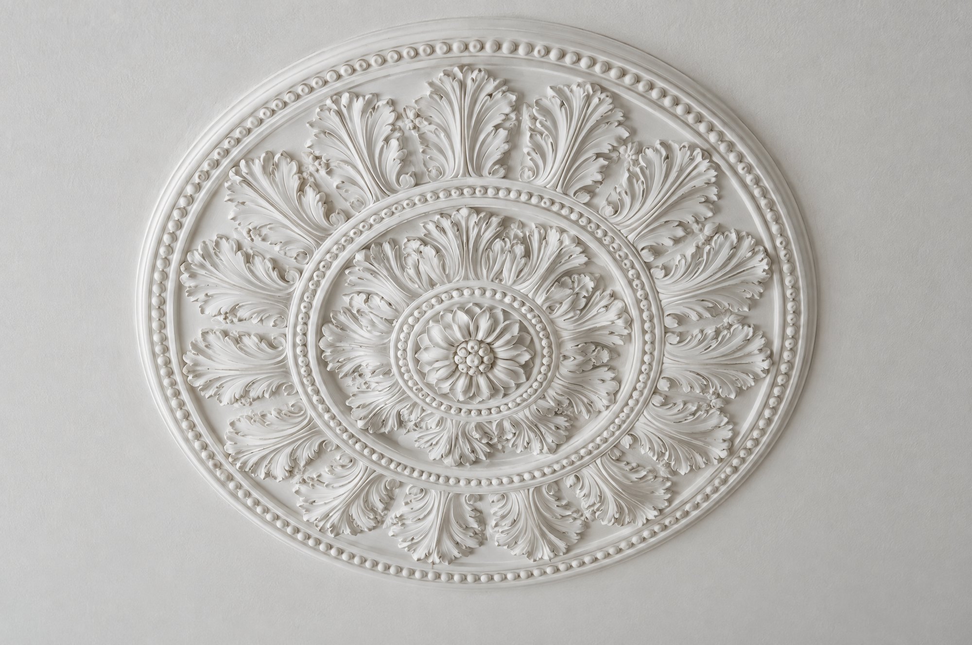 The same medallion with the lost ornament recreated from the surviving pattern